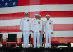 U.S. Coast Guard Capt. Bradford Apitz, Rear Adm. Jeffery Novak, the Coast Guard Southwest District commander, and Capt. Patrick Dill, the Coast Guard Air Station Sacramento commander, pose during a change of command ceremony at Air Station Sacramento, McClellan Park, California, July 31, 2026. During the ceremony Dill was formally recognized as the new air station commander. (U.S. Coast Guard photo by Petty Officer 3rd Class Kenneth Wiese)