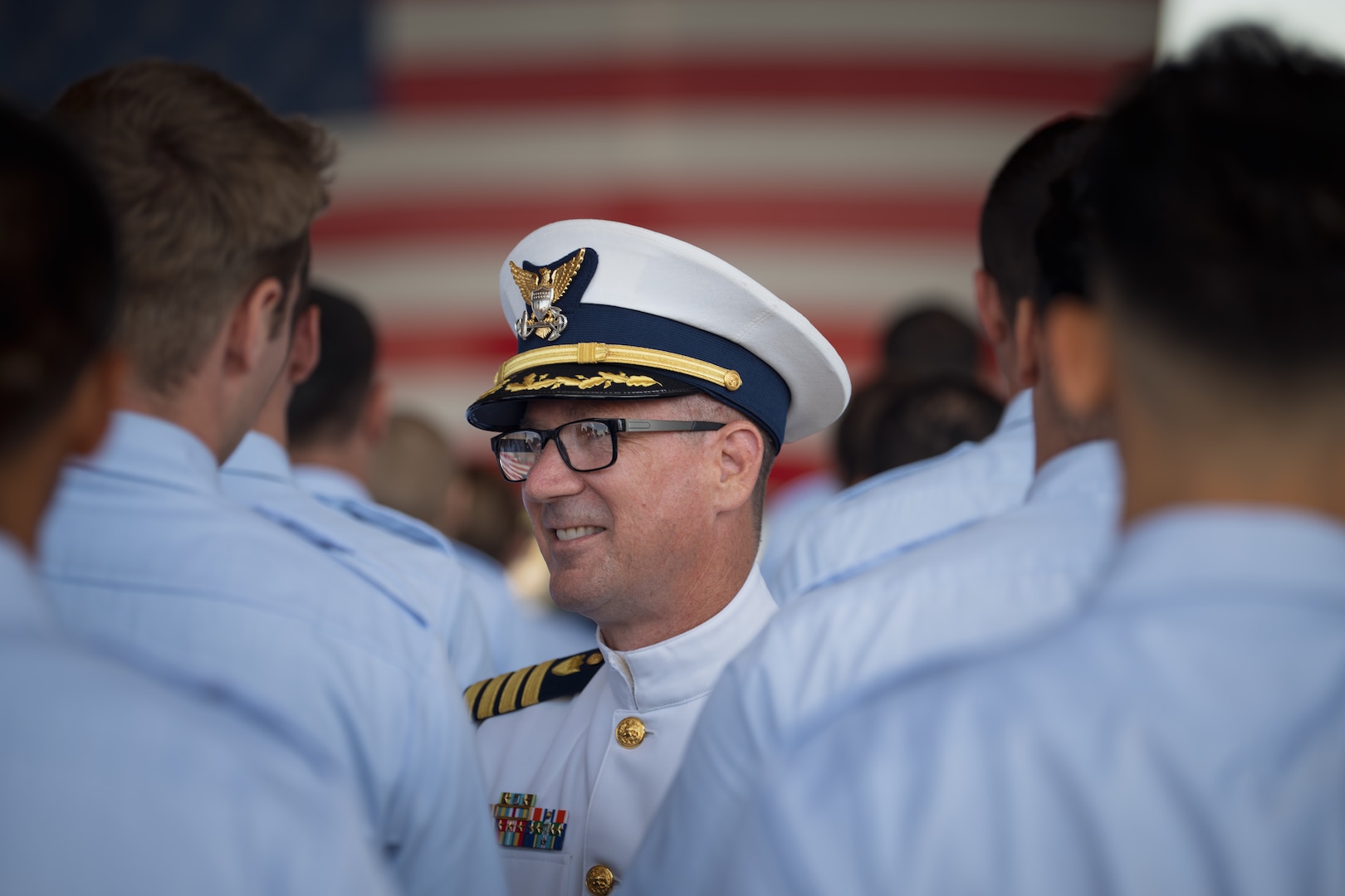 U.S. Coast Guard Capt. Captain Patrick Dill conducts a unit inspection at Air Station Sacramento, McClellan Park, California, July 31, 2026. Following the inspection, Dill was formally recognized as the new air station commander during a change of command ceremony. (U.S. Coast Guard photo by Petty Officer 3rd Class Kenneth Wiese)