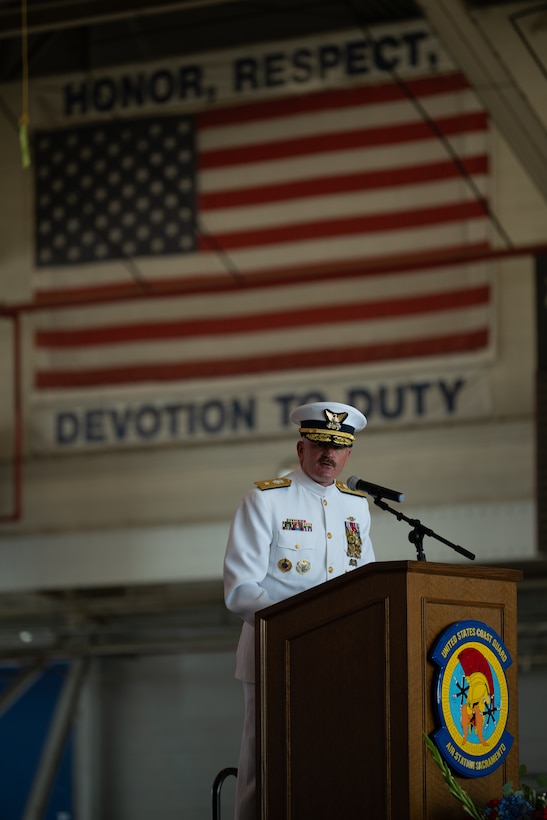 U.S. Coast Guard Rear Adm. Jeffery Novak, the Coast Guard Southwest District commander, addresses audience members during a change of command ceremony at Air Station Sacramento, McClellan Park, California, July 31, 2026. During the ceremony, Coast Guard Capt. Patrick Dill was formally recognized as the new air station commander. (U.S. Coast Guard photo by Petty Officer 3rd Class Kenneth Wiese)