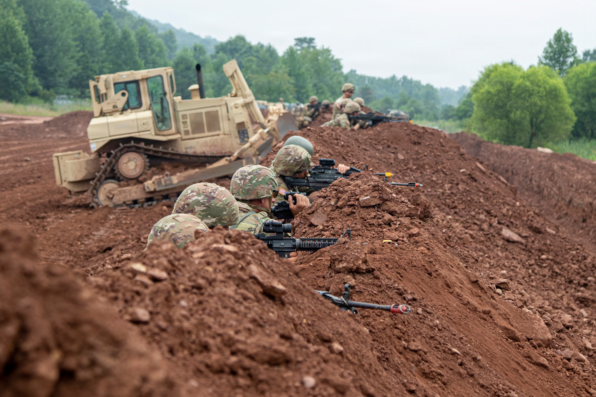 U.S. Army Soldiers assigned to the Pennsylvania Army National Guard's 55th Maneuver Enhancement Brigade participate in the brigade's first Support Area Field Training Exercise during annual training at Fort Indiantown Gap, Pennsylvania, July 20–22, 2026. The exercise brought together approximately 1,100 Soldiers to train in a realistic, contested Division Support Area, challenging engineers, military police, sustainment personnel and brigade staff to protect critical sustainment operations, maintain freedom of movement and respond to evolving battlefield threats in preparation for future large-scale combat operations. (U.S. Army National Guard photo by Sgt. 1st Class Shane Smith)