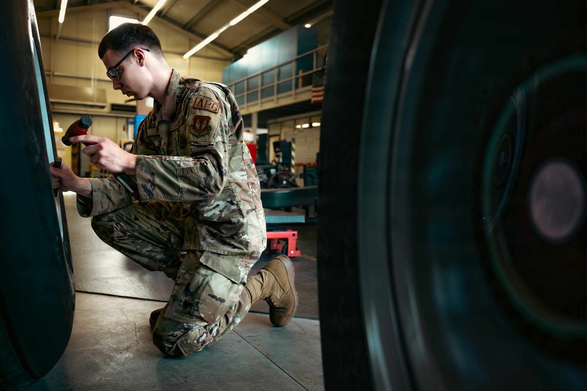 U.S. Air Force Senior Airman Andrew Bolek, 86th Maintenance Squadron wheel and tire journeyman, hammers the rim off a C-130J Super Hercules aircraft tire at Ramstein Air Base, Germany, May 29, 2026.