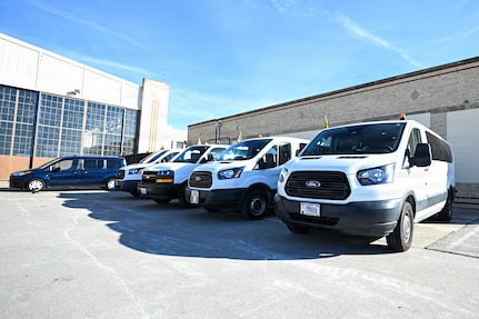 Government owned vehicles line the alert facility during a nuclear operational response exercise at McConnell Air Force Base, Kansas, Feb. 7, 2026. The vehicles were used to transport the Airmen taking part in the exercise from the alert facility to the flightline. (U.S. Air Force photo by Senior Airman Amelio Brown)