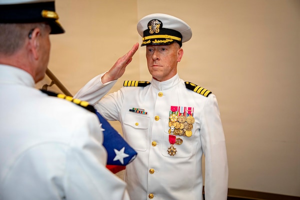 Rear Adm. Robert Hawkins, commander, Naval Medical Forces Atlantic (NMFL), arrives at the retirement ceremony of Capt. Chad McKenzie, deputy commander, NMFL and a native of Bellefontaine, Ohio, on board Naval Support Activity (NSA) Hampton Roads - Portsmouth Annex, Portsmouth, Virginia, May 29, 2026. McKenzie served the Navy for nearly 30 years of dedicated service across 16 commands and helped advance Navy Medicine’s operational readiness and expeditionary medical capabilities in support of Fleet, Marine Corps, and joint force requirements.  (U.S. Navy photo by Mass Communication Specialist 2nd Class Levi Decker)