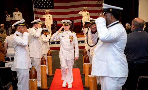 Capt. Chad McKenzie, deputy commander, Naval Medical Forces Atlantic (NMFL) and a native of Bellefontaine, Ohio, is piped ashore during his retirement ceremony on board Naval Support Activity (NSA) Hampton Roads - Portsmouth Annex, Portsmouth, Virginia, May 29, 2026. McKenzie served the Navy for nearly 30 years of dedicated service across 16 commands and helped advance Navy Medicine’s operational readiness and expeditionary medical capabilities in support of Fleet, Marine Corps, and joint force requirements. (U.S. Navy photo by Mass Communication Specialist 2nd Class Levi Decker)
