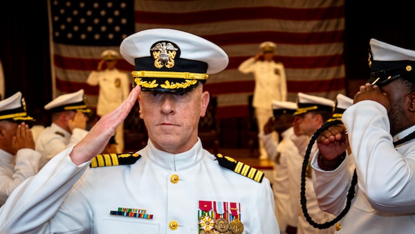Capt. Chad McKenzie, deputy commander, Naval Medical Forces Atlantic (NMFL) and a native of Bellefontaine, Ohio, is piped ashore during his retirement ceremony on board Naval Support Activity (NSA) Hampton Roads - Portsmouth Annex, Portsmouth, Virginia, May 29, 2026. McKenzie served the Navy for nearly 30 years of dedicated service across 16 commands and helped advance Navy Medicine’s operational readiness and expeditionary medical capabilities in support of Fleet, Marine Corps, and joint force requirements. (U.S. Navy photo by Mass Communication Specialist 2nd Class Levi Decker)