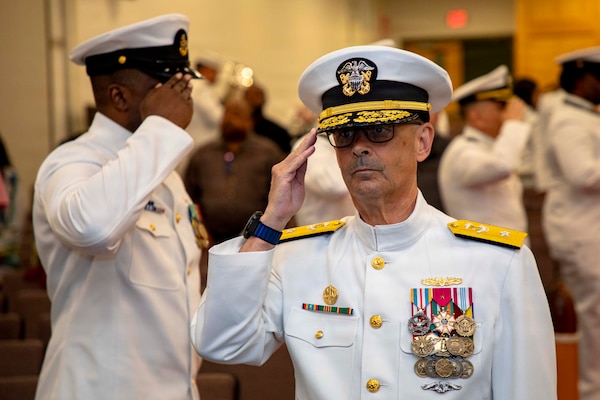 Rear Adm. Robert Hawkins, commander, Naval Medical Forces Atlantic (NMFL), arrives at the retirement ceremony of Capt. Chad McKenzie, deputy commander, NMFL and a native of Bellefontaine, Ohio, on board Naval Support Activity (NSA) Hampton Roads - Portsmouth Annex, Portsmouth, Virginia, May 29, 2026. McKenzie served the Navy for nearly 30 years of dedicated service across 16 commands and helped advance Navy Medicine’s operational readiness and expeditionary medical capabilities in support of Fleet, Marine Corps, and joint force requirements.  (U.S. Navy photo by Mass Communication Specialist 2nd Class Levi Decker)