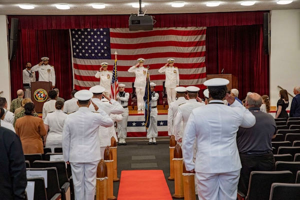 Sailors parade the colors during the retirement ceremony of Capt. Chad McKenzie, deputy commander, Naval Medical Forces Atlantic and a native of Bellefontaine, Ohio, on board Naval Support Activity (NSA) Hampton Roads - Portsmouth Annex, Portsmouth, Virginia, May 29, 2026. McKenzie served the Navy for nearly 30 years of dedicated service across 16 commands and helped advance Navy Medicine’s operational readiness and expeditionary medical capabilities in support of Fleet, Marine Corps, and joint force requirements. (U.S. Navy photo by Mass Communication Specialist 2nd Class Levi Decker)
