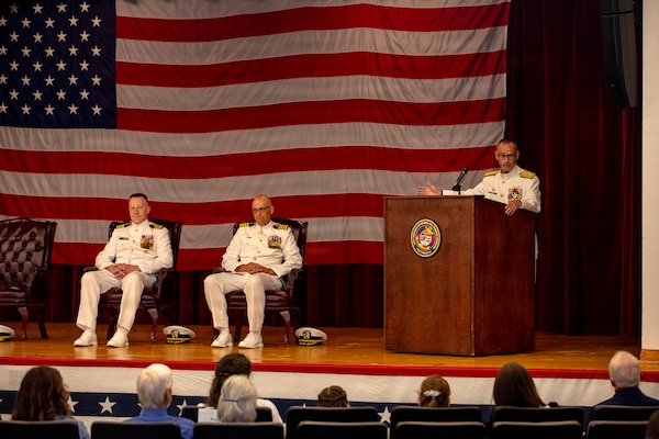 Rear Adm. Robert Hawkins, commander, Naval Medical Forces Atlantic (NMFL), gives remarks during the retirement ceremony of Capt. Chad McKenzie, deputy commander, NMFL and a native of Bellefontaine, Ohio, on board Naval Support Activity (NSA) Hampton Roads - Portsmouth Annex, Portsmouth, Virginia, May 29, 2026. McKenzie served the Navy for nearly 30 years of dedicated service across 16 commands and helped advance Navy Medicine’s operational readiness and expeditionary medical capabilities in support of Fleet, Marine Corps, and joint force requirements.  (U.S. Navy photo by Mass Communication Specialist 2nd Class Levi Decker)