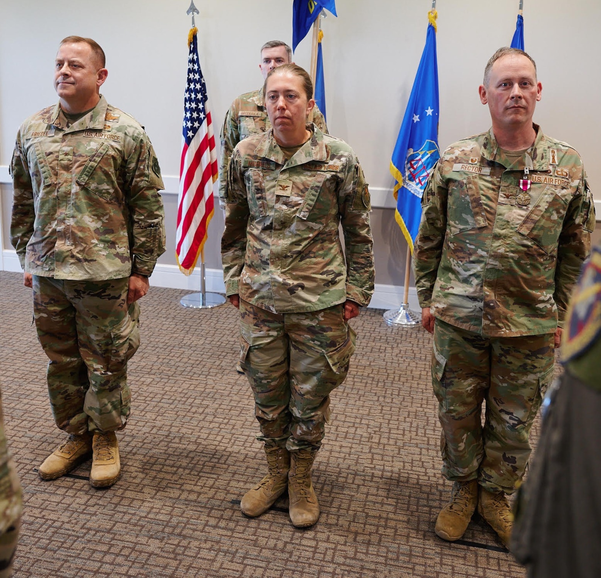 (Left) Air Force Operational Test and Evaluation Center Commander Brig. Gen. Jesse J. Friedel stands beside Col. Denise M. Michaels, incoming AFOTEC Detachment 3 Commander, and Col. Adam T. Rector, departing AFOTEC Detachment 3 Commander during the May 28, 2026 Change of Command ceremony at Hill AFB, Utah.