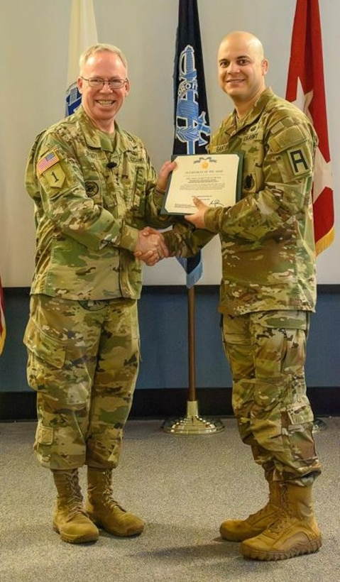 Sgt. 1st Class Alberto Santana (right) of First Army represented Western Hemisphere Command in the Army Inspector General of the Year competition.