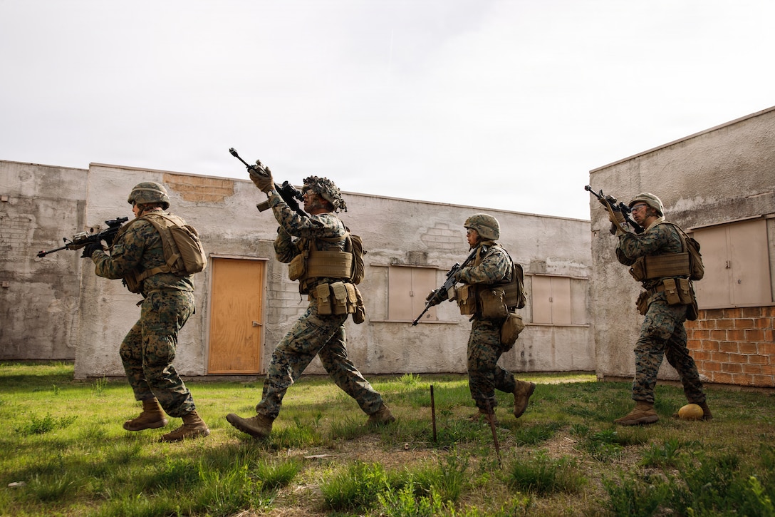 U.S. Marine Corps students with Company A, The Basic School, Training Command, participate in the Warfighting Field Exercise at Marine Corps Base Quantico, Virginia, April 22, 2026. WARFEX serves as the culminating event at TBS, evaluating students’ proficiency in decision-making, small-unit tactics, and leadership as they operate under sustained physical and mental pressure in a realistic warfighting scenario. (U.S. Marine Corps photo by Cpl. Joshua Barker)