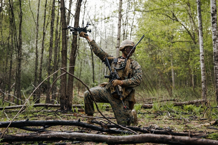 U.S. Marine Corps 2nd Lt. Luke Lynch, a student with Company A, The Basic School, Training Command, assists in launching a Skydio X2D Small Unmanned Aircraft System during the Warfighting Field Exercise at Marine Corps Base Quantico, Virginia, April 22, 2026. WARFEX serves as the culminating event at TBS, evaluating students’ proficiency in decision-making, small-unit tactics, and leadership as they operate under sustained physical and mental pressure in a realistic warfighting scenario. (U.S. Marine Corps photo by Cpl. Joshua Barker)