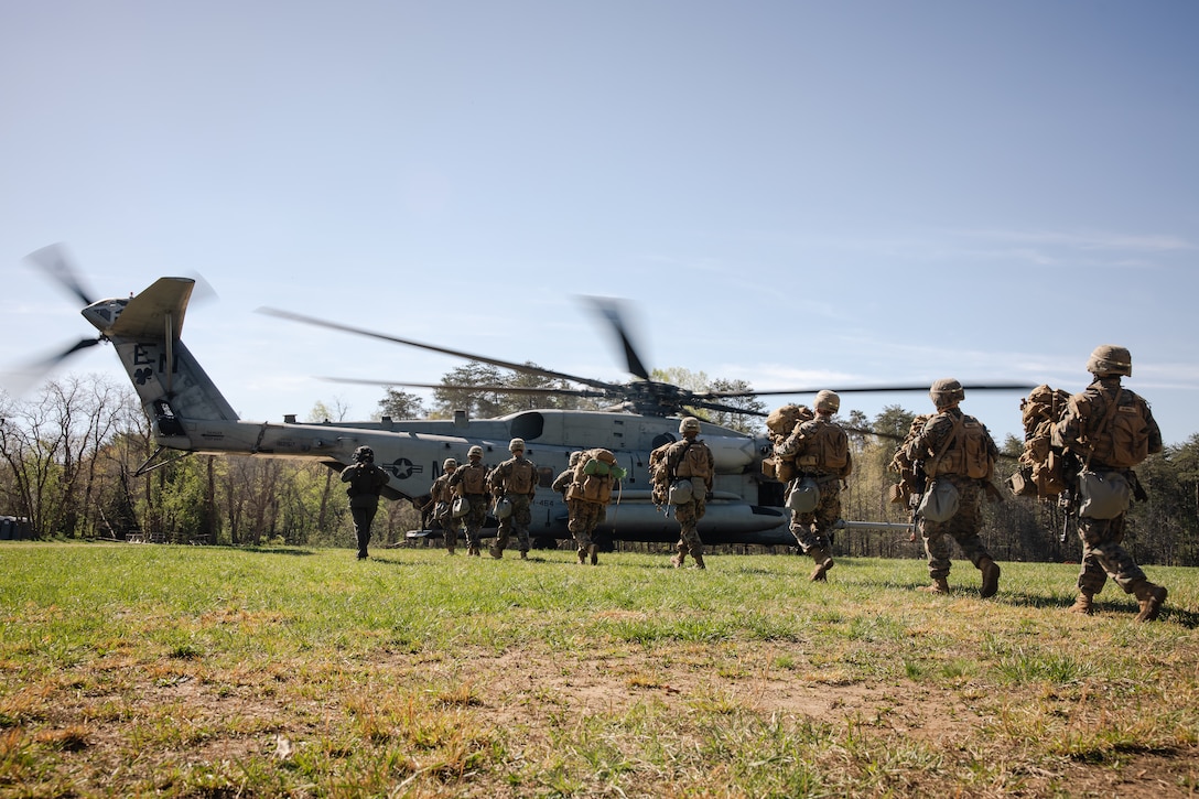 U.S. Marine Corps students with Company B, The Basic School embark a CH-53E Super Stallion with Heavy Helicopter Squadron (HMH) 464, Marine Aircraft Group 29, 2nd Marine Aircraft Wing during field exercise 3 at Marine Corps Base Quantico, Virginia, April 6, 2026. FEX III serves as an evaluated field training exercise for students in the Basic Officer Course at The Basic School. (U.S. Marine Corps photo by Cpl. Joshua Barker)