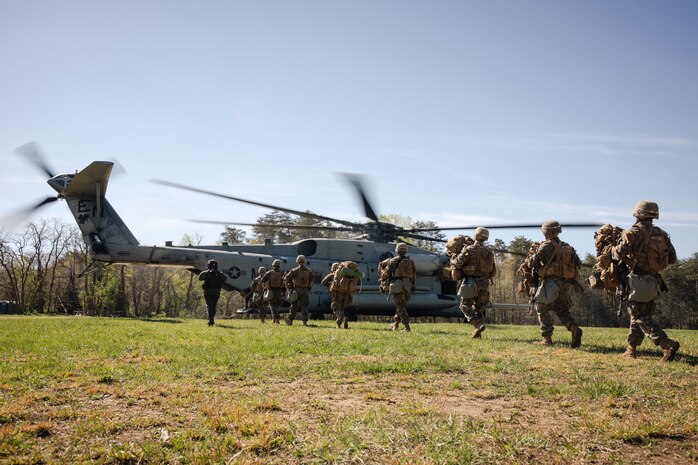U.S. Marine Corps students with Company B, The Basic School embark a CH-53E Super Stallion with Heavy Helicopter Squadron (HMH) 464, Marine Aircraft Group 29, 2nd Marine Aircraft Wing during field exercise 3 at Marine Corps Base Quantico, Virginia, April 6, 2026. FEX III serves as an evaluated field training exercise for students in the Basic Officer Course at The Basic School. (U.S. Marine Corps photo by Cpl. Joshua Barker)