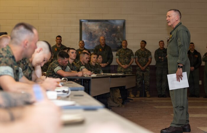 U.S. Marine Corps Lt. Gen. William Swan, the deputy commandant of aviation, discusses the aviation field with students from The Basic School during Marine Aviation Night at TBS on Marine Corps Base Quantico, Virginia, April 27, 2026. Marine Aviation Night is an event held for TBS students interested in Marine aviation and provides them with an opportunity to speak with aviation experts. (U.S. Marine Corps photo by Sgt. Chancellor Reynolds)