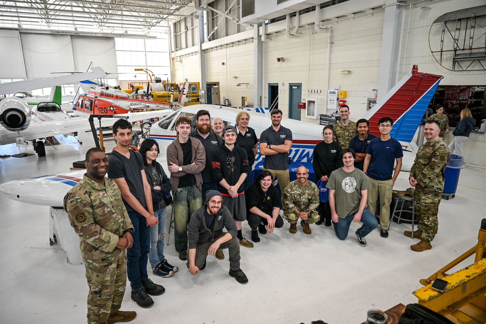 U.S. Air Force Chief Master Sgt. Israel Nuñez, senior enlisted advisor to the Chief of Air Force Reserve, the Pentagon, Arlington, Virginia, and the Command Chief Master Sgt. of Air Force Reserve Command, Robins Air Force Base, Georgia, poses with AFR recruiters from the 350th Recruiting Squadron, Joint Base McGuire-Dix-Lakehurst, New Jersey, and aircraft maintenance students at Connecticut Aero Tech School for Aviation Maintenance Technicians, May 7, 2026, Hartford, Connecticut. Nuñez teamed up with Senior Master Sgt. Jared Locavara, recruiting flight chief at Westover Air Reserve Base, Massachusetts, Chief Master Sgt. Aaron Fowler, 350RCS accessions superintendent, and Chief Master Sgt. Armil Rucker, 350RCS senior enlisted leader, to share the "Reserve Advantage" message that offers benefits, flexibility, and a life of service with aircraft maintenance students at CT Aero Tech School for Aviation Maintenance Technicians. (U.S. Air Force photo by Master Sgt. Della Creech)