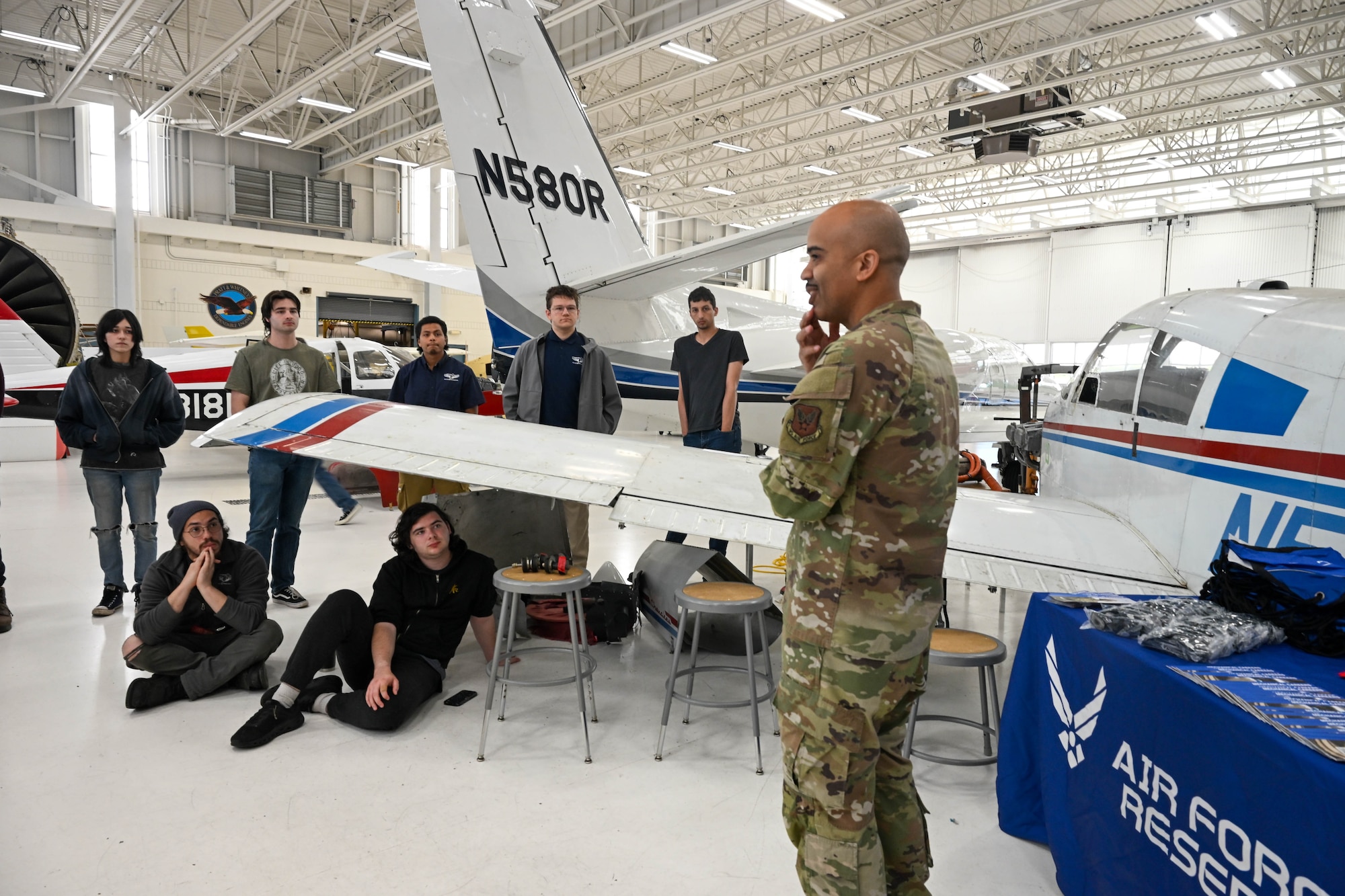 U.S. Air Force Chief Master Sgt. Israel Nuñez, senior enlisted advisor to the Chief of Air Force Reserve, the Pentagon, Arlington, Virginia, and the Command Chief Master Sgt. of Air Force Reserve Command, Robins Air Force Base, Georgia, discusses the future of Air Force maintenance training with aircraft maintenance students at Connecticut Aero Tech School for Aviation Maintenance Technicians, Hartford, Connecticut, during a tour May 7, 2026, Hartford, Connecticut. Nuñez teamed up with AFR recruiters from the 350th Recruiting Squadron, Joint Base McGuire-Dix-Lakehurst, New Jersey, to share the "Reserve Advantage" message that offers benefits, flexibility and a life of service, with aircraft maintenance students at CT Aero Tech. (U.S. Air Force photo by Master Sgt. Della Creech)