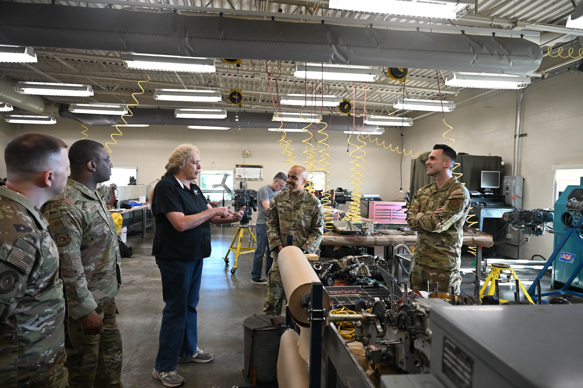 Dawn Graham, department head at Connecticut Aero Tech School for Aviation Maintenance Technicians, Hartford, Connecticut, discusses maintenance training environment evolution with U.S. Air Force Chief Master Sgt. Israel Nuñez, senior enlisted advisor to the Chief of Air Force Reserve, the Pentagon, Arlington, Virginia, and the Command Chief Master Sgt. of Air Force Reserve Command, Robins Air Force Base, Georgia, May 7, 2026, Hartford, Connecticut. Nuñez, teamed up with AFR recruiters from the 350th Recruiting Squadron, Joint Base McGuire-Dix-Lakehurst, New Jersey, to share the "Reserve Advantage" message that offers benefits, flexibility and a life of service, with aircraft maintenance students at CT Aero Tech. (U.S. Air Force photo by Master Sgt. Della Creech)
