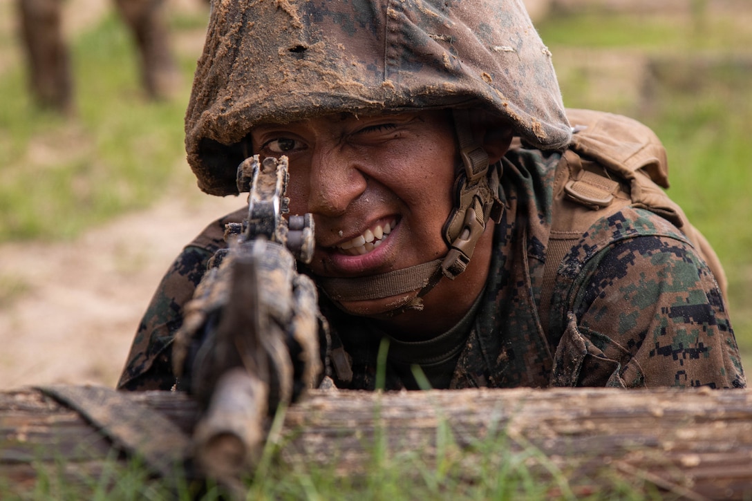 A U.S. Marine Corps recruit with Delta Company, 1st Recruit Training Battalion, buddy rushes during the Crucible on Marine Corps Recruit Depot Parris Island, S.C., May 29, 2026. The crucible is the culminating event that marks the transition from recruit to Marine. (U.S. Marine Corps photo by Lance Cpl. Katherine Fohn)