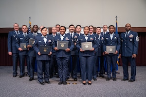 Community College of the Air Force graduates and leaders pose for a photo on their graduation day at Gunter Annex, Alabama, May 28, 2026.