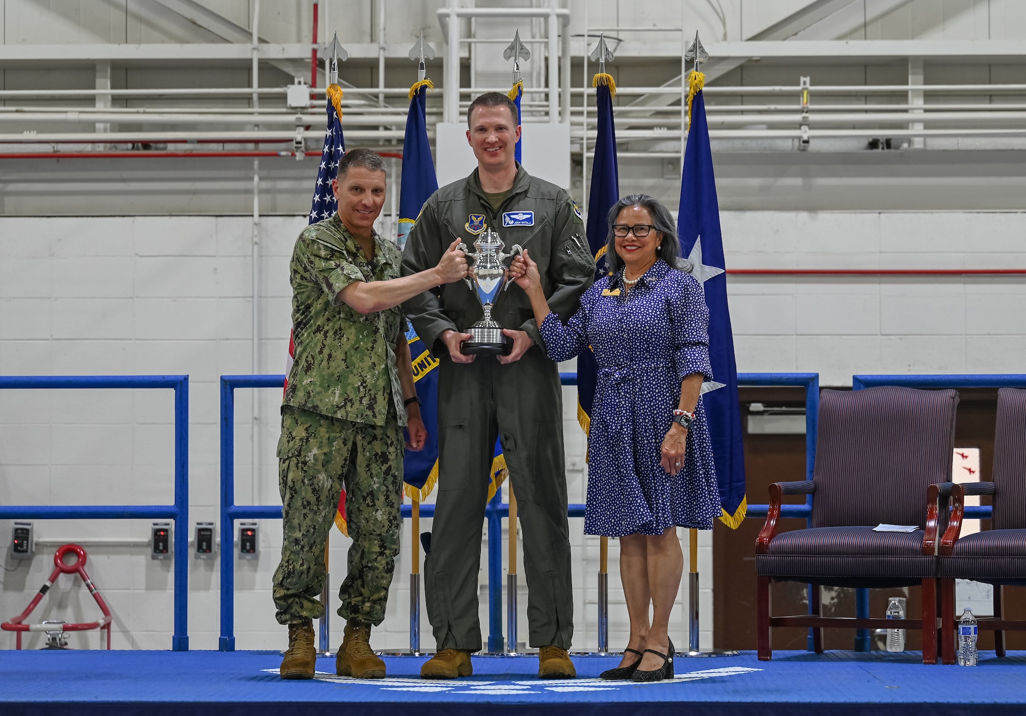 From left, U.S. Navy Adm. Richard Correll, commander, U.S. Strategic Command, U.S. Air Force Col. Joshua Wiitala, 509th Bomb Wing commander, and U.S. Sen. Rita Sanders, R-NE, hold the 2025 Omaha Trophy at Whiteman Air Force Base, Missouri, May 26, 2026.