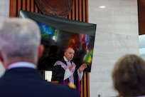 Maj. John F. Reutemann, deputy wing chaplain for the 51st Fighter Wing, leads a religious service during an interment ceremony for former French Korean War veterans André Datcharry and Jacques Grisolet at the United Nations Memorial Cemetery in Busan, South Korea, on May 27, 2026.