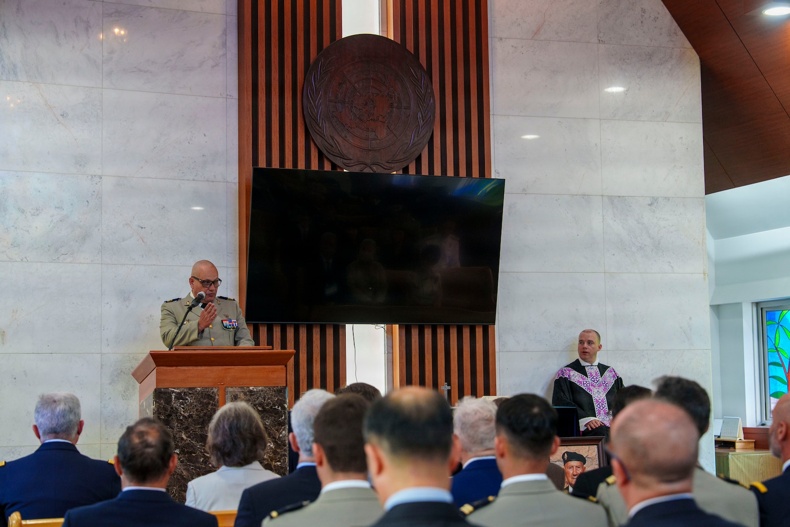 French Army Col. Olivier LeClerca delivers remarks during an interment ceremony honoring former French Korean War veterans André Datcharry and Jacques Grisolet at the United Nations Memorial Cemetery in Korea, in Busan, South Korea, on May 27, 2026.