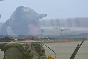 Airman uses radio.