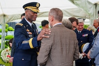 U.S. Army Gen. Xavier T. Brunson, commander of United Nations Command, Republic of Korea/U.S. Combined Forces Command, and U.S. Forces Korea, greets the family of French Korean War veteran Jacques Grisolet following an interment ceremony for Grisolet and fellow veteran André Datcharry at the United Nations Memorial Cemetery Korea in Busan, South Korea, on May 27, 2026.