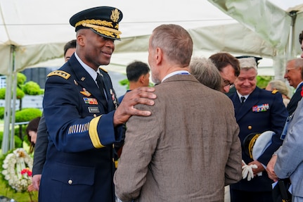 U.S. Army Gen. Xavier T. Brunson, commander of United Nations Command, Republic of Korea/U.S. Combined Forces Command, and U.S. Forces Korea, greets the family of French Korean War veteran Jacques Grisolet following an interment ceremony for Grisolet and fellow veteran André Datcharry at the United Nations Memorial Cemetery Korea in Busan, South Korea, on May 27, 2026.