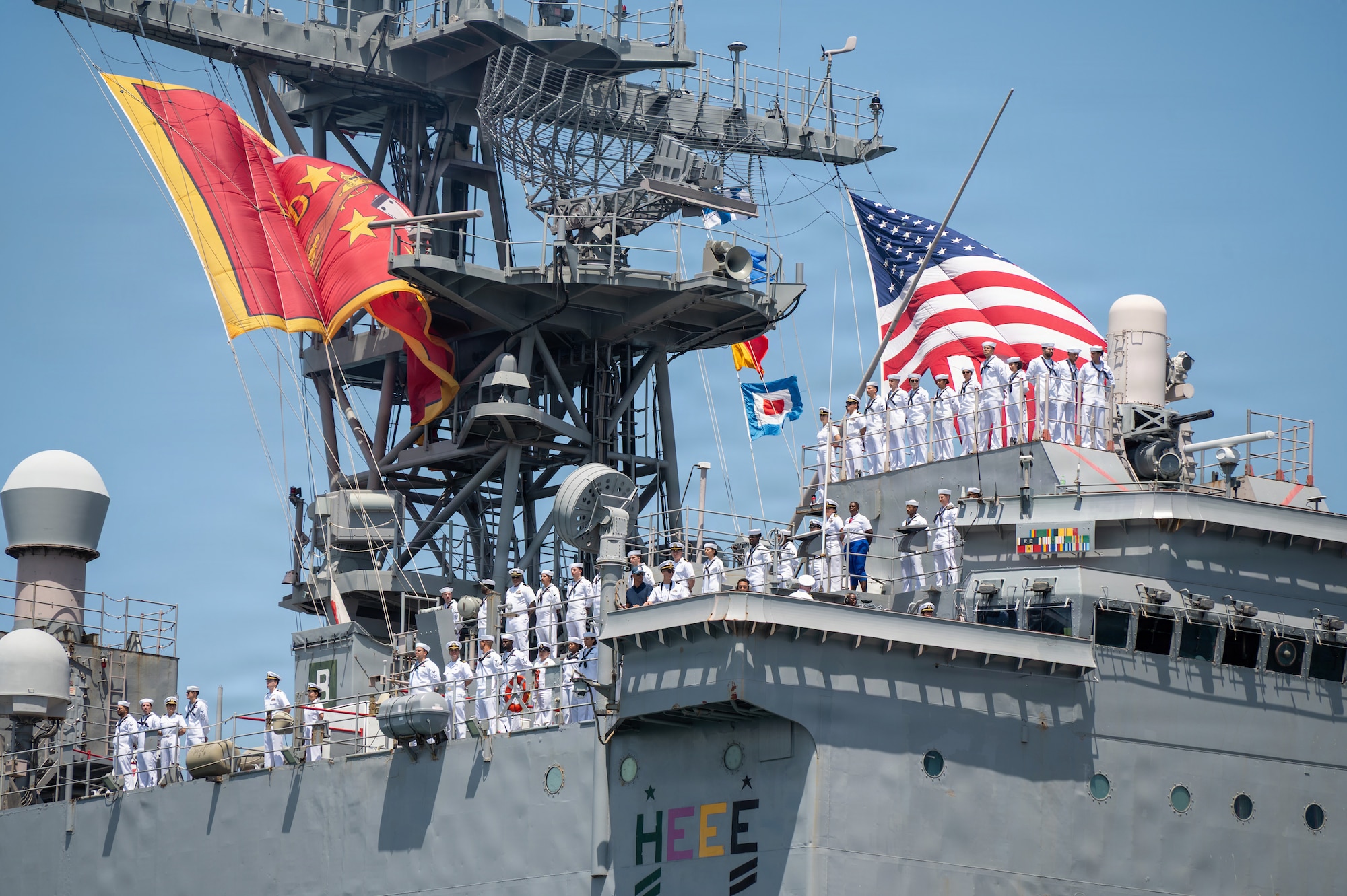 Sailors, assigned to Whidbey Island-class amphibious dock landing ship USS Ashland (LSD 48), man the rails as the ship returns to its homeport of Naval Base San Diego, June 1, 2026. Ashland returns following operations in the U.S. 7th Fleet. An integral part of the U.S. Pacific Fleet, U.S. 3rd Fleet leads naval forces in the Indo-Pacific and provides the realistic, relevant training necessary to execute the U.S. Navy's role across the full spectrum of military operations. U.S. 3rd Fleet works together with allies and partners to advance freedom of navigation and overflight, the rule of law and other principles that underpin security for the Indo-Pacific region. (U.S. Navy photo by Mass Communication Specialist 2nd Class Aja Bleu Campbell)