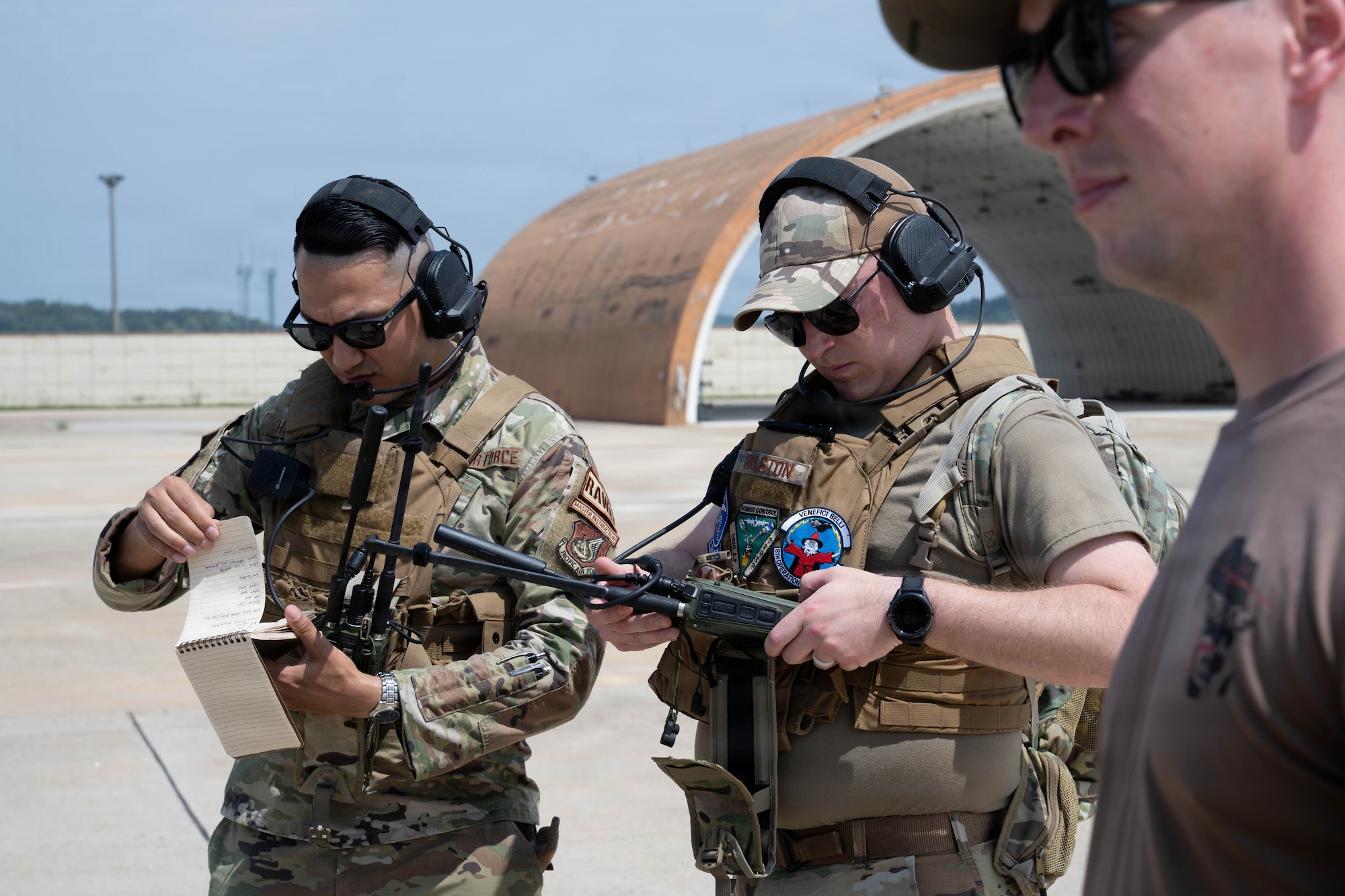 Airmen use radios.