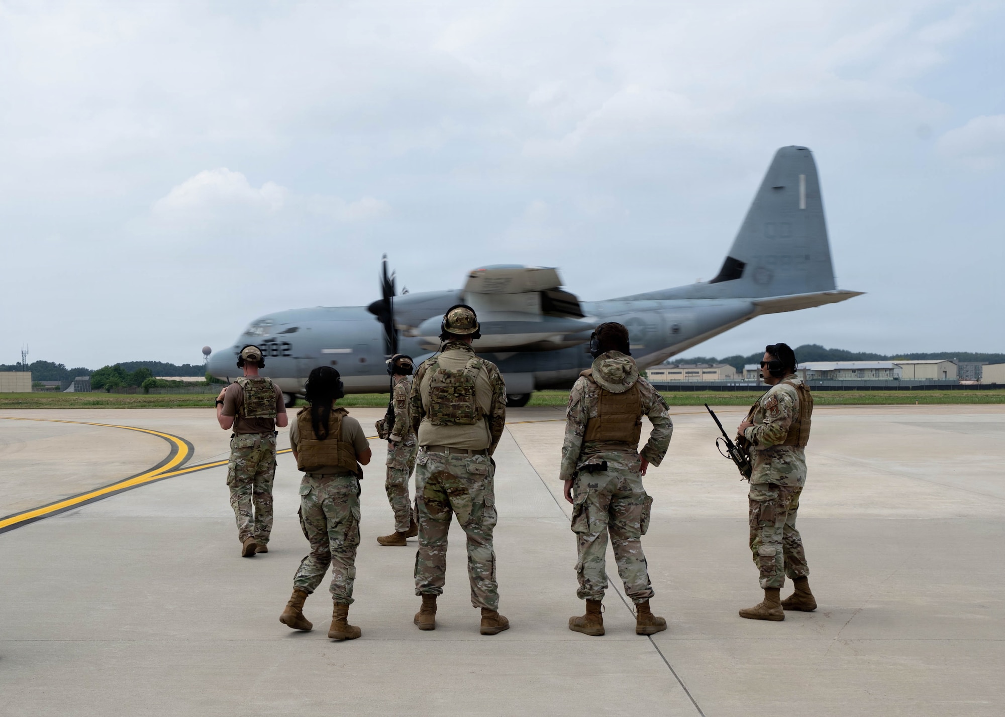 Airmen observe aircraft.