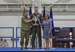 From left, U.S. Navy Adm. Richard Correll, commander, U.S. Strategic Command, U.S. Air Force Col. Joshua Wiitala, 509th Bomb Wing commander, and U.S. Sen. Rita Sanders, R-NE, hold the 2025 Omaha Trophy at Whiteman Air Force Base, Missouri, May 26, 2026.
