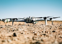 The drone was used to carry aerial targets, allowing defenders to simulate counter-drone engagements during the qualification. Joint Interagency Task Force 401 hosted the qualification event to strengthen counter drone capabilities across multiple Department of War Services and components. (U.S. Air Force photo by Staff Sgt. Michael A. Richmond)