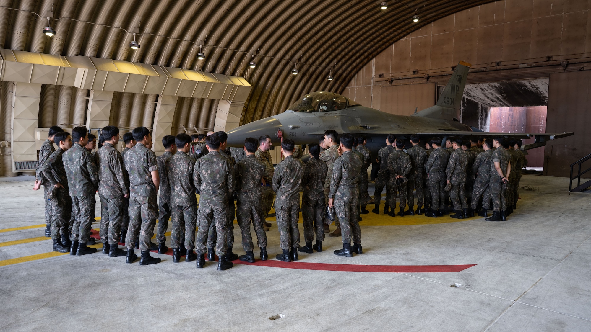 U.S. Air Force Airmen tour ROKAF senior cadets on Osan capabilities.