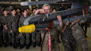U.S. Air Force Airmen tour ROKAF senior cadets on Osan capabilities.