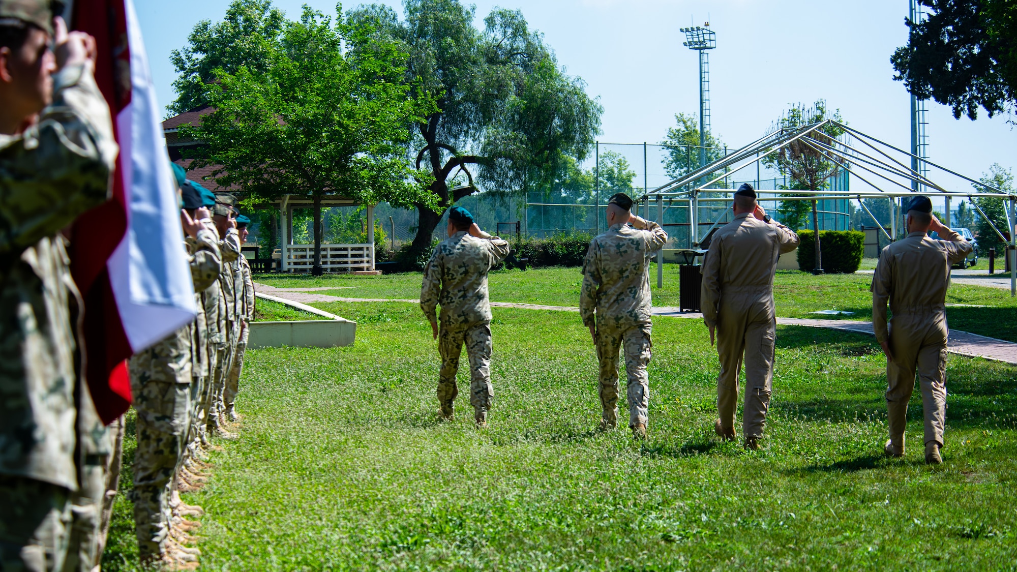 Polish military member renders a salute