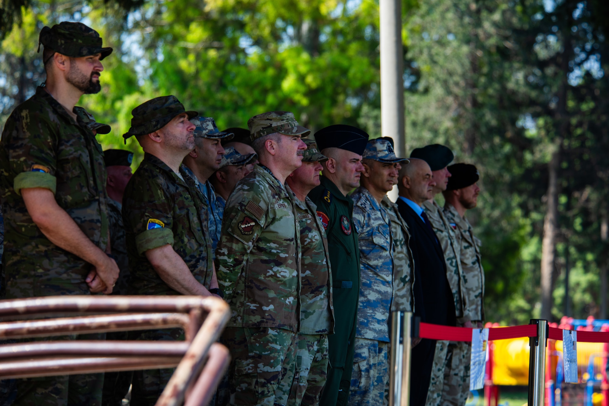 U.S. military members stand with Allied partners during a Polish Change of Command ceremony