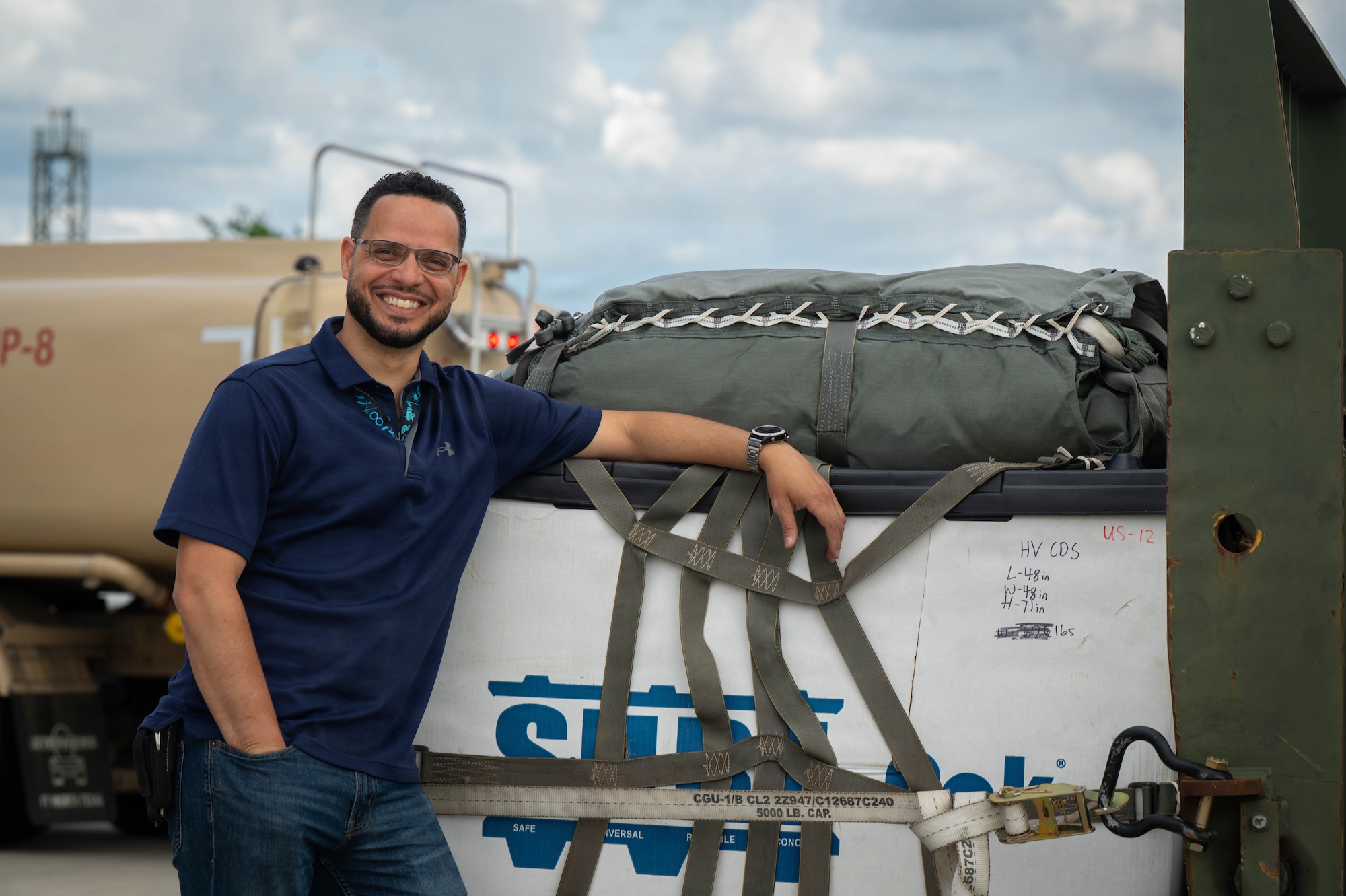 Charlie Garcia, 86th Logistics Readiness Squadron aerial delivery supervisor, poses on the flightline at Ramstein Air Base, Germany, May 21, 2026.