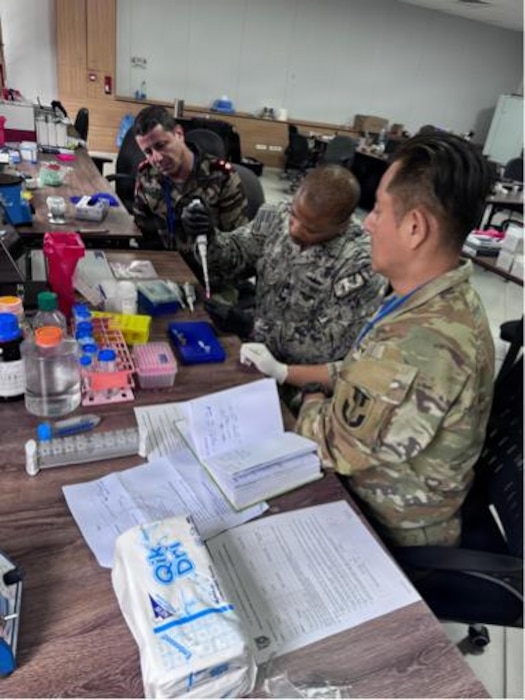 AGADIR, Morocco (April 29, 2026) Cmdr. Benjamin J. Espinosa, Naval Medical Research Unit (NAMRU) EURAFCENT science director, performs a BioFire RP2 analysis on a sick call sample during exercise African Lion. NAMRU EURAFCENT, part of Navy Medicine Research & Development, conducts research, surveillance and studies of vaccines, therapeutic agents, diagnostic assays and vector control measures in the EUCOM, AFRICOM and CENTCOM Areas of Responsibility to better prevent and treat infectious diseases in support of Navy, Marine Corps and joint U.S. warfighter health, readiness and lethality. (Courtesy photo by Maj. Paul Lenhart /Released)