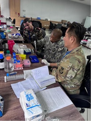 AGADIR, Morocco (April 29, 2026) Cmdr. Benjamin J. Espinosa, Naval Medical Research Unit (NAMRU) EURAFCENT science director, performs a BioFire RP2 analysis on a sick call sample during exercise African Lion. NAMRU EURAFCENT, part of Navy Medicine Research & Development, conducts research, surveillance and studies of vaccines, therapeutic agents, diagnostic assays and vector control measures in the EUCOM, AFRICOM and CENTCOM Areas of Responsibility to better prevent and treat infectious diseases in support of Navy, Marine Corps and joint U.S. warfighter health, readiness and lethality. (Courtesy photo by Maj. Paul Lenhart /Released)