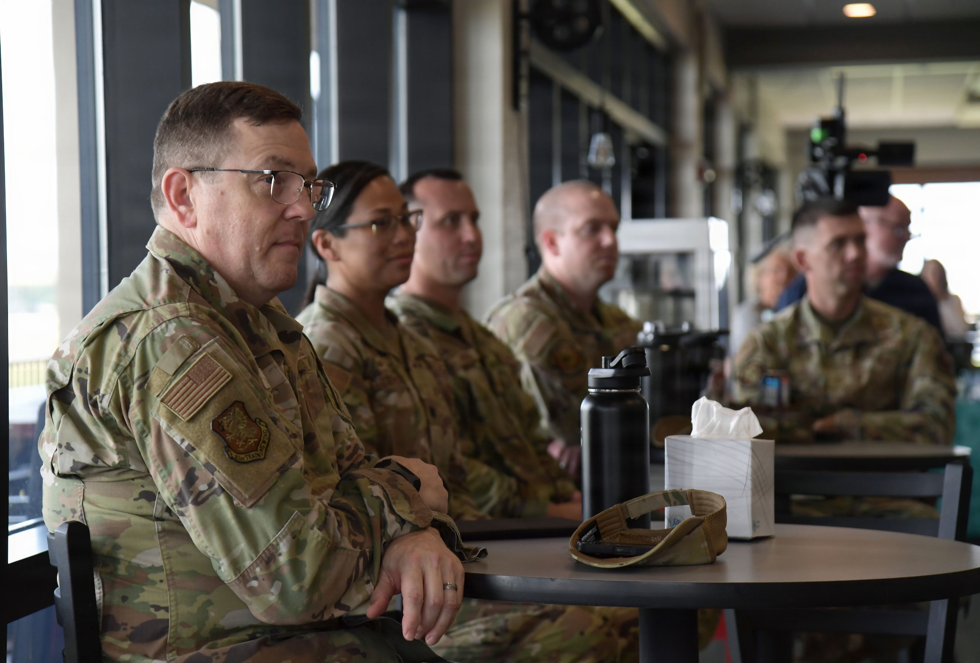 A person in military uniform chares their personal story.