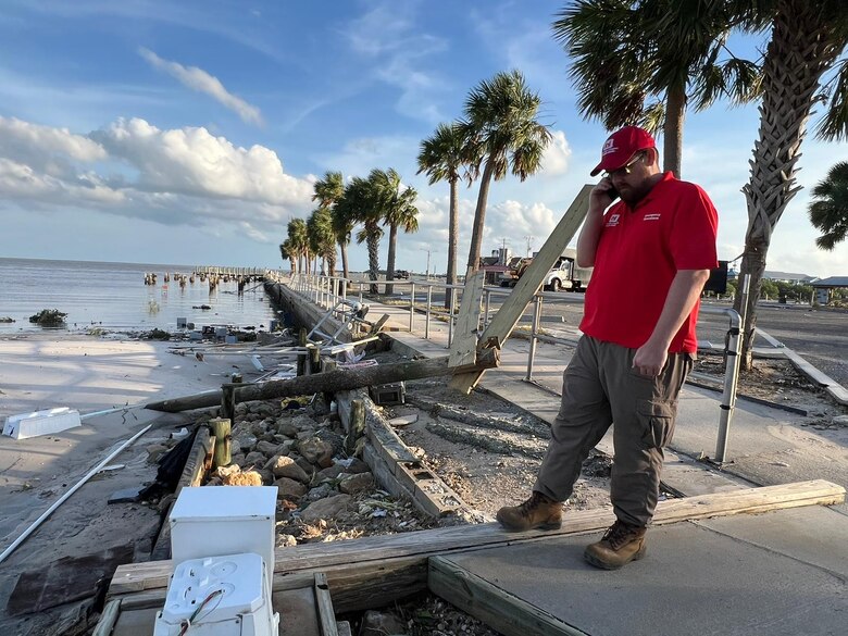 Jake Edwards, a liaison officer with the U.S. Army Corps of Engineers Jacksonville District, surveys hurricane damage from high water in Cedar Key, Fla. Sept. 28, 2024 following storm Hurricane Helene.USACE brings unique capabilities to emergency responses, but we are just one piece of a much larger Army and DOD team working to support our federal, state, and local partners. (USACE photo by Mark Rankin)