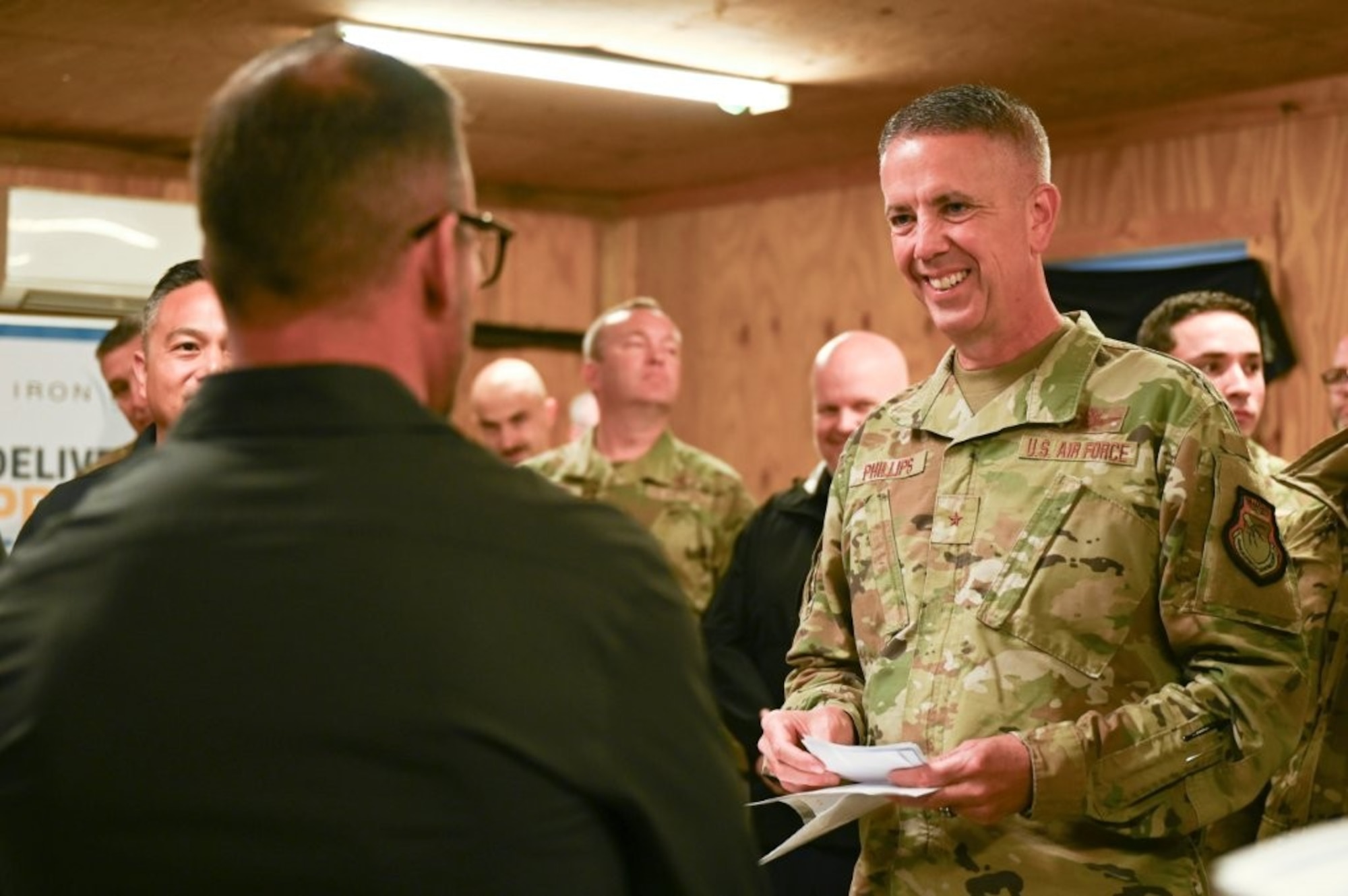 U.S. Air Force Brig. Gen. Jeffrey Phillips, right, Air Combat Command director of Cyberspace Operations and Warfighting Communications (ACC/A6), visits a vendor during the Raptor Town Tactical Communications Demonstration at Joint Base Langley-Eustis, Virginia, May 7, 2026. Phillips was given demonstrations that highlighted a broad spectrum of advanced deployable tactical communications technologies.