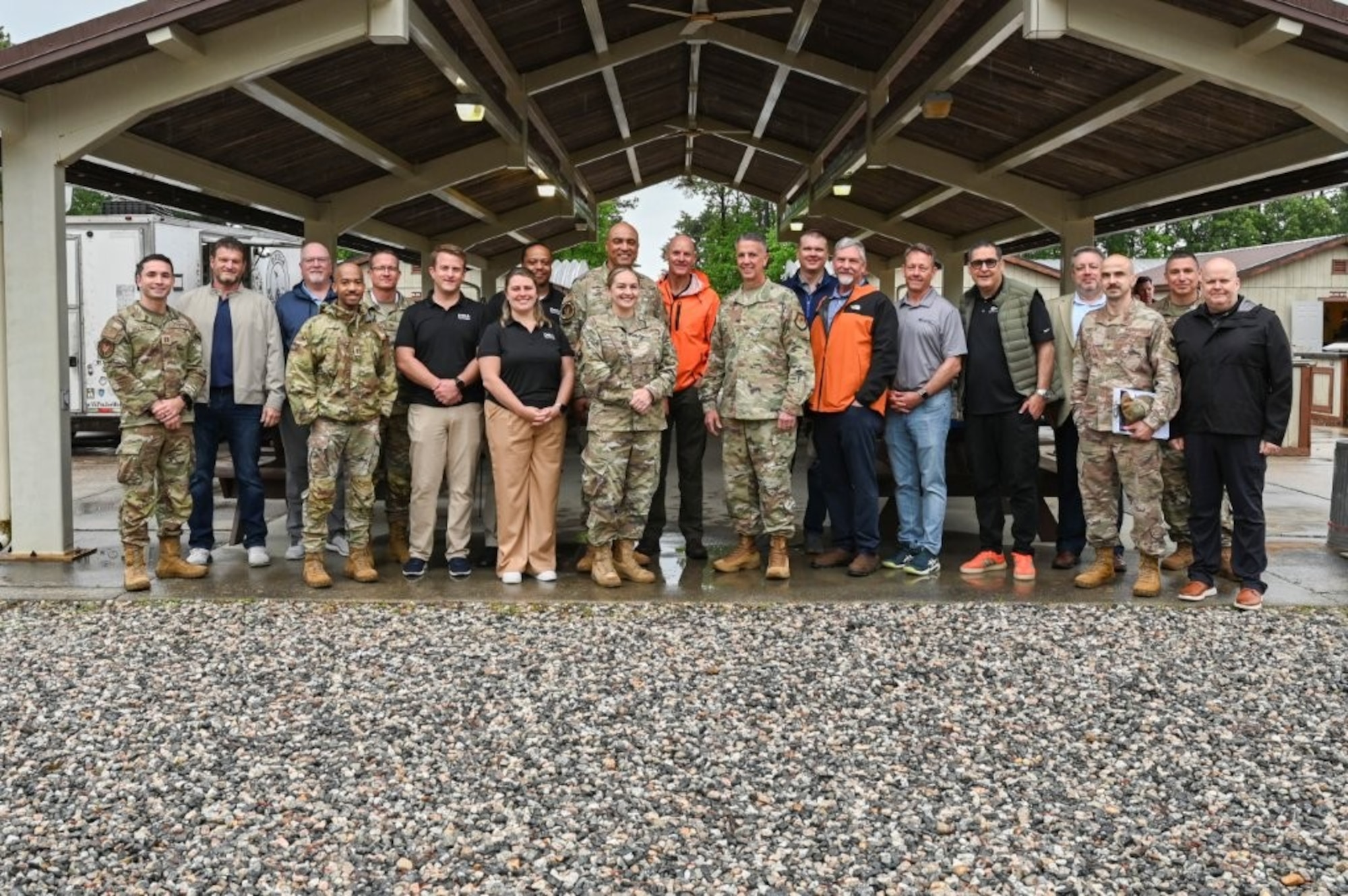 U.S. Air Force members and industry representatives gather for a group photo during the Raptor Town Tactical Communications Demonstration at Joint Base Langley-Eustis, Virginia, May 7, 2026. The event provided an environment for leaders from across the Air Force to discuss innovative solutions for deployable network kits.