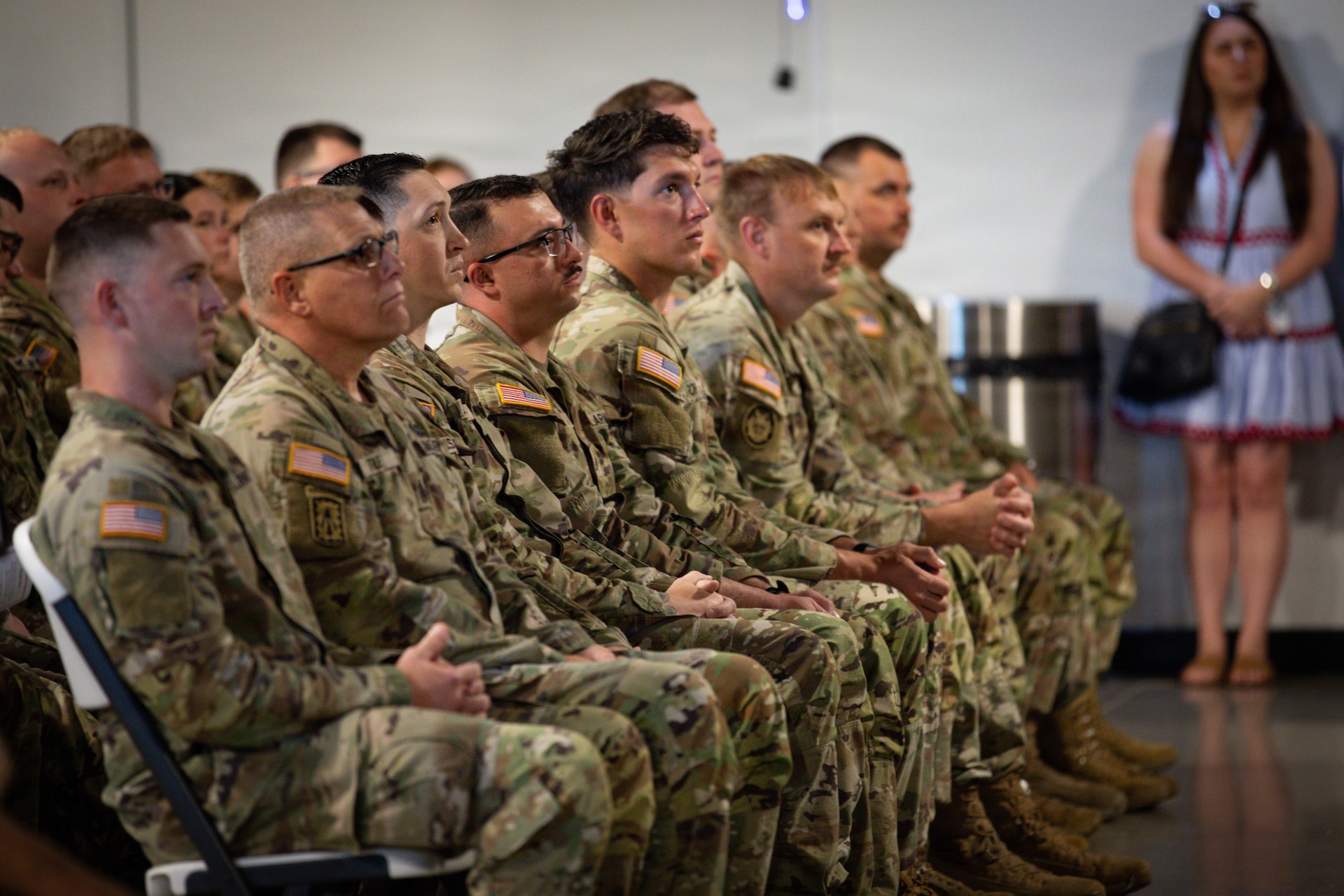 Soldiers of Kentucky's 201st Engineer Battalion, 149th Maneuver Enhancement Brigade, listen to remarks during their departure ceremony at the Boyd County Community Center in Catlettsburg, Kentucky, May 30, 2026.