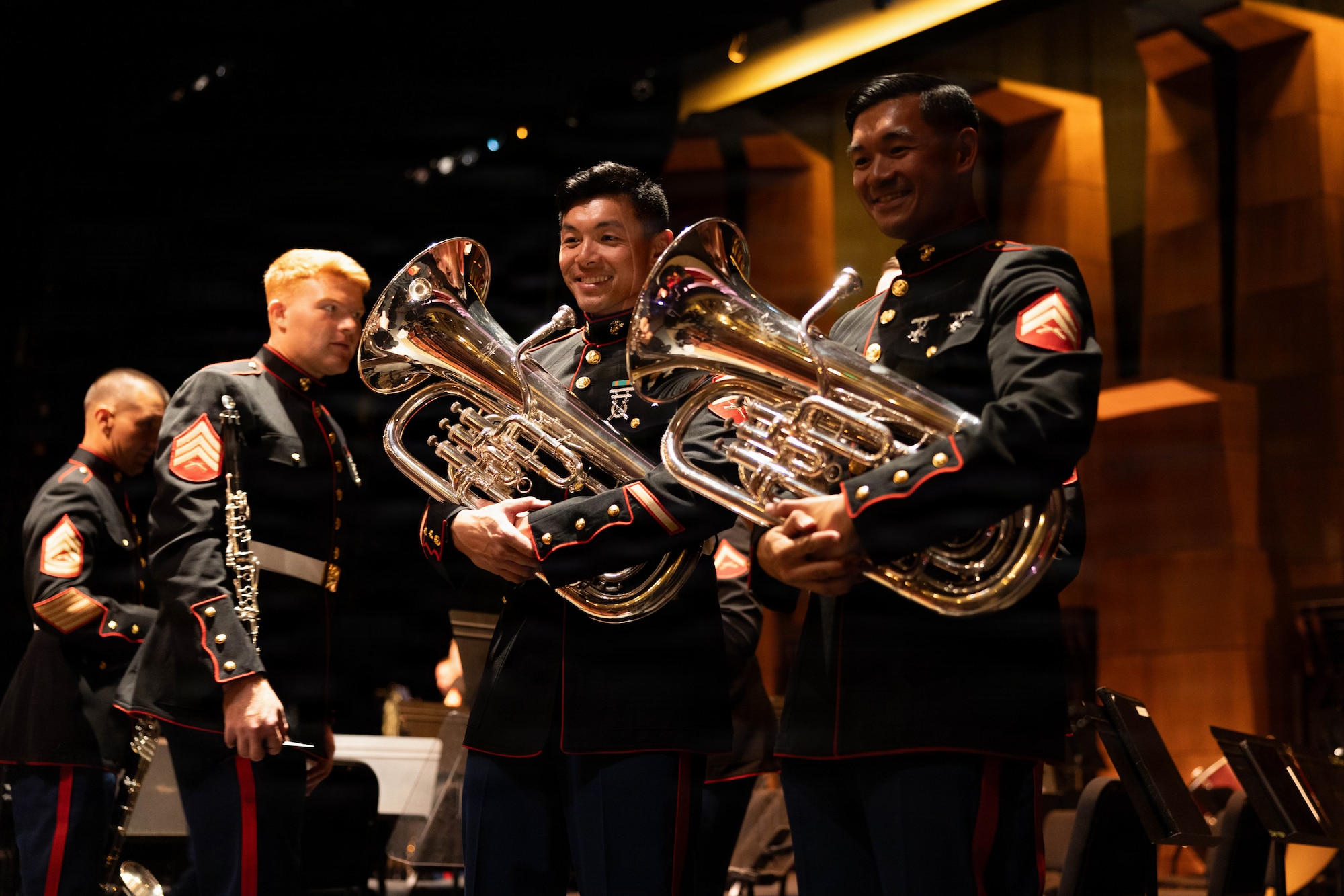 U.S. Marine Corps Sgt. Victor Tran, center left, and Cpl. Casey Tran, both musicians with the West Coast Composite Band, pose for a photo during a performance at the California Center for the Arts, Escondido, California, April 1, 2026. Marine Corps musicians from across the west coast came together to perform for the 250th anniversary of the founding of the United States. Both are natives of California. (U.S. Marine Corps photo by Cpl. Sawyer Carleton)