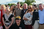 Retired Sgt. 1st Class Sammie L. Davis, a Medal of Honor recipient, is pictured with his grandson, Pfc. Reuben Brinkmeter, and family members at the U.S. Army Medical Center of Excellence 68W graduation, March 15 on MacArthur Parade Field.