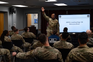U.S. Air Force Chief Master Sgt. Nicholas Conner, 87th Air Base Wing command chief, addresses service members attending the Leading Edge course at Joint Base McGuire-Dix-Lakehurst, N.J., May 18, 2026. Leading Edge focused on building joint leaders who understand the functionality, operations and customs and courtesies of each branch. (U.S. Air Force photo by Airman 1st Class Haeleigh Bayle)